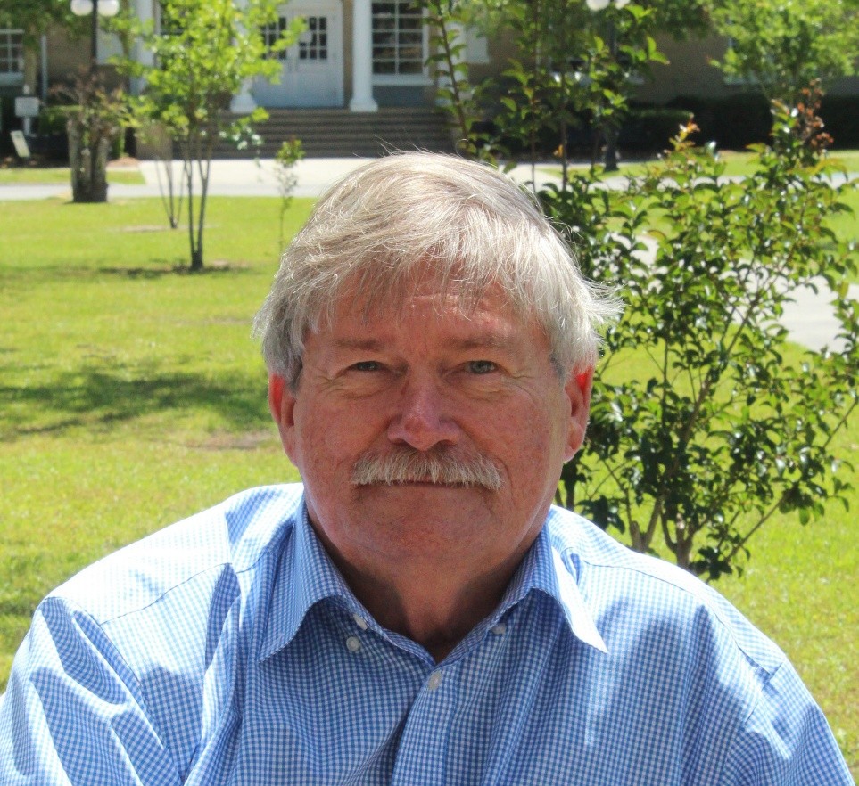 Portrait of Dr. Kit Carson, Chair of Teacher Education at AMSC